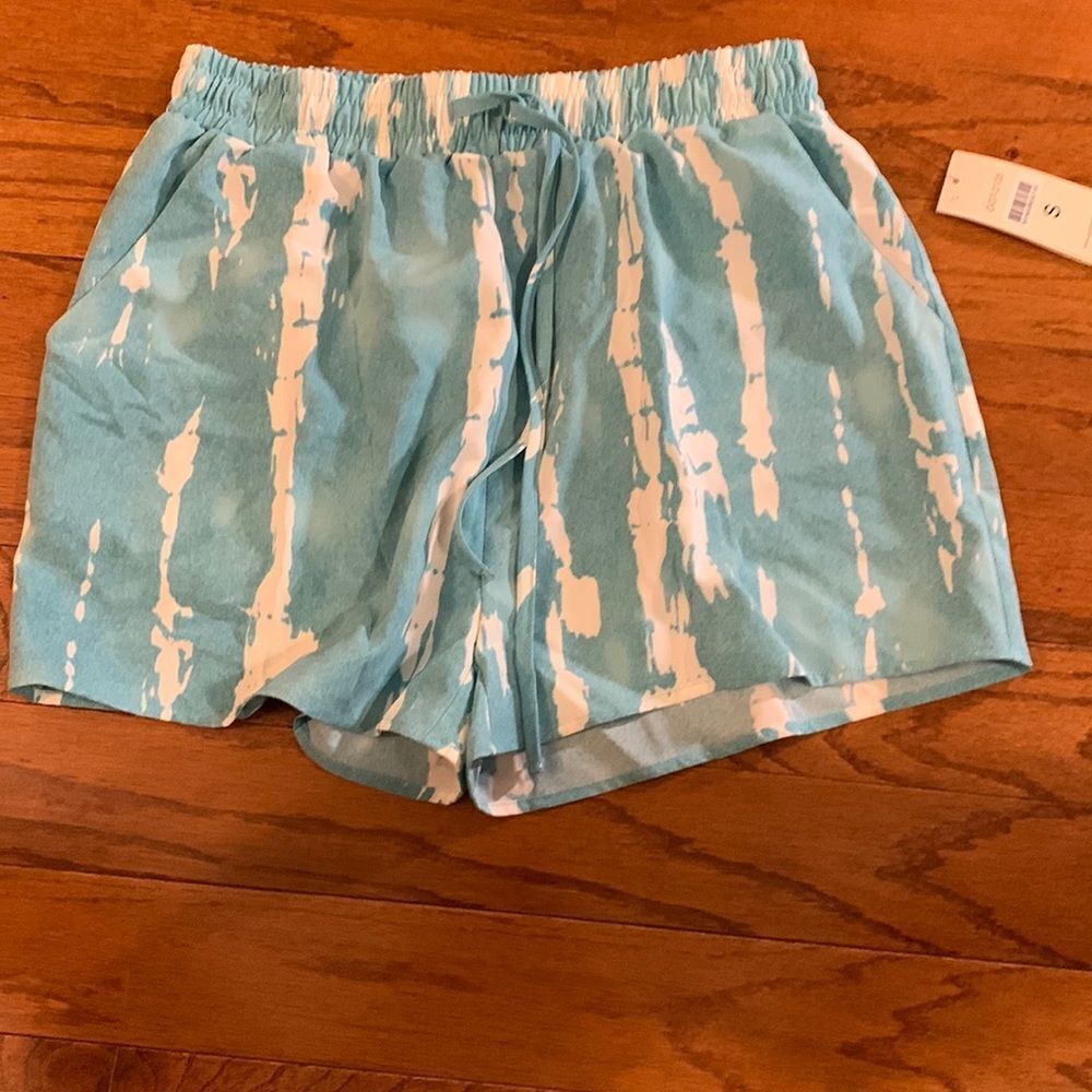 Young USA Size Small blue and white tie-dye pocketed shorts.